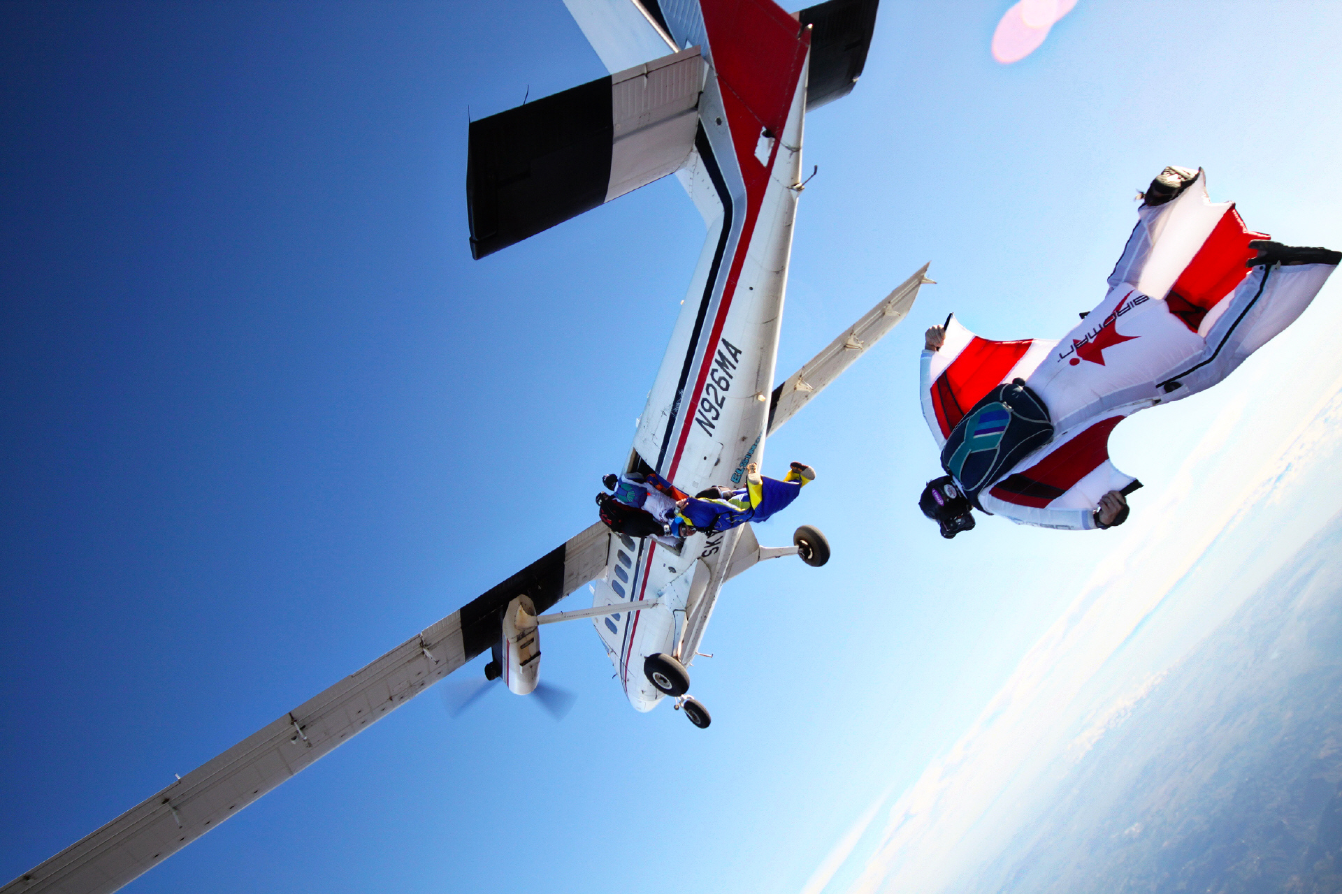 Wingsuit fly. Wingsuit Flying. Экстремальные виды спорта. Wingsuit Flying вид спорта. Вингсьют обои.